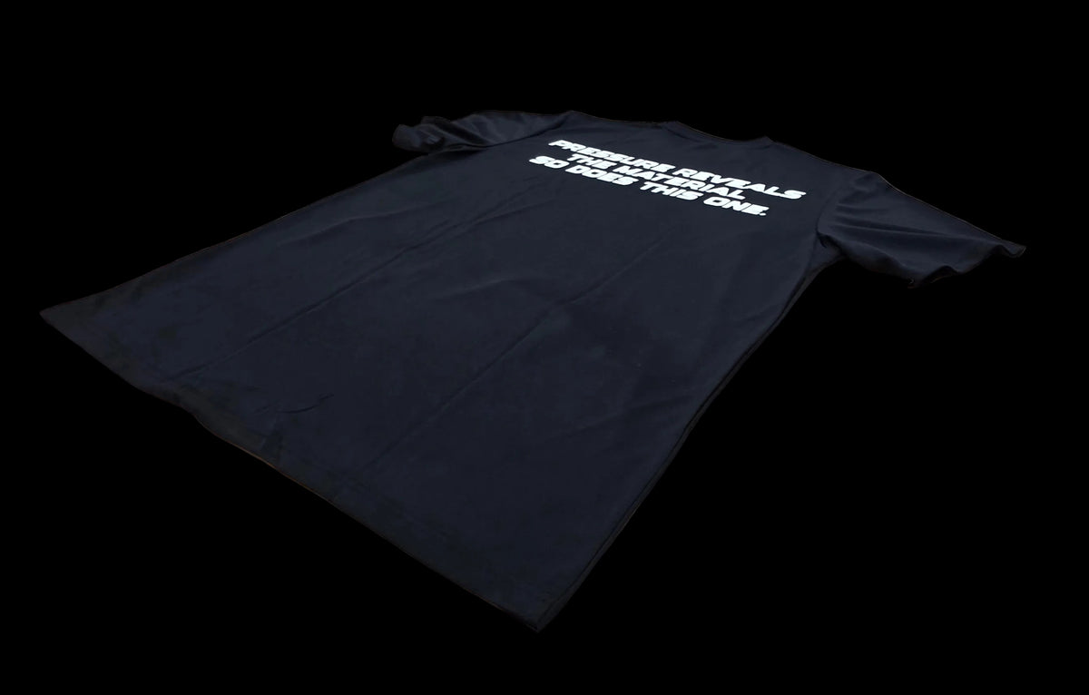 Camiseta Técnica KineryX — Pressure Reveals The Material. So Does This One.